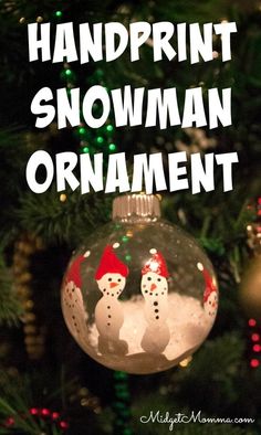 a snowman ornament hanging from a christmas tree with the words handprint snowman ornament on it