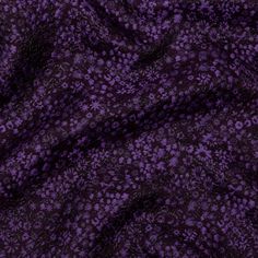 purple and black fabric with small flowers on it