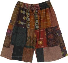 Bring out your inner strength with these tribal patterned mixed patchwork Bermuda shorts.  These cargo shorts are unisex and come with a drawstring waist and buttoned side pockets for ease of comfort. #tlb #Patchwork #Stonewash #Pocket #vacationclothing #Fall #Paisley #bohemianfashion #Cottonhalfpants #Unisexbohopants #Bohocargopants