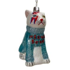 a glass ornament with a cat wearing a scarf