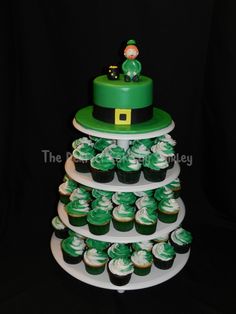 cupcakes are arranged in the shape of a st patrick's day cake