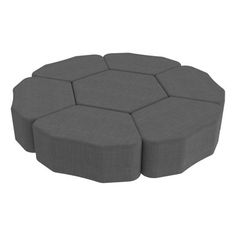 a grey ottoman with six seats on top and four sides, all facing the same direction