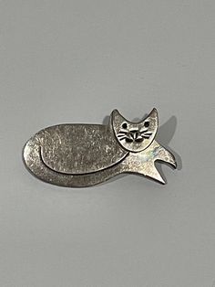 Sterling Silver Cat Brooch Pin 925 Mexico  Approx. 2" L X 2" H Weight-14 grams Vintage Used Good Condition Show Scratches As found refer to the photos Mid-century Silver Brooches For Collectors, Mid-century Silver Brooch For Collectors, Vintage Handmade Silver Pins, Handmade Vintage Silver Pins, Sterling Silver Cat, Silver Cat, Cat Brooch, Oct 31, Brooch Pin