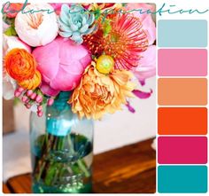 a vase filled with flowers sitting on top of a table next to a wooden table