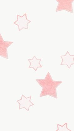 pink and white stars are flying in the air on a white background with soft pastel colors