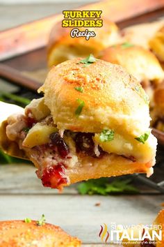 the turkey sliders are loaded with meat and cheese