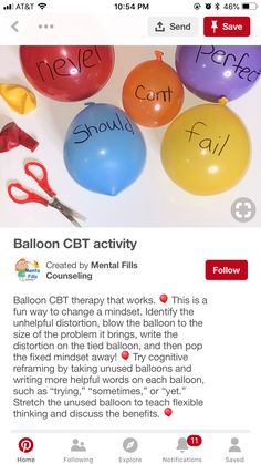 balloons with writing on them sitting next to scissors