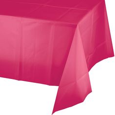 a bright pink tablecloth on a white background