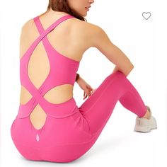 Make A Run For It In This Cardio-Ready Jumpsuit Cut From A Stretchy, Buttery-Soft Knit With A Bold, Strappy Back And The Light Support Of A Built-In Shelf Bra. 23" Inseam; 9" Leg Opening (Size Medium) Scoop Neck Built-In Shelf Bra 80% Polyester, 20% Elastane Machine Wash, Tumble Dry Imported *Item Is Nwot. Never Worn. Sleeveless Yoga Jumpsuits And Rompers With Built-in Bra, Sleeveless Yoga Jumpsuits With Built-in Bra, Sleeveless Jumpsuits And Rompers With Built-in Bra For Yoga, Pink Stretch Jumpsuits And Rompers For Gym, Pink Sleeveless Jumpsuits And Rompers For Workout, Sleeveless Pink Bodysuit For Yoga, Pink Jumpsuits And Rompers For Gym, Summer Yoga Pink Bodysuit, Pink Summer Bodysuit For Yoga