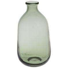 a green glass vase sitting on top of a white table next to a black handle