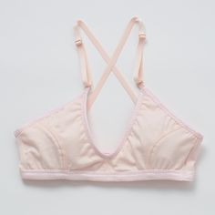 Playful and versatile, this bra is ready for all the adventures your day holds. Wear the convertible straps crossed in back or vertical to accommodate your favorite blouses—or to show off, if you choose. In lightweight, buttery-soft organic cotton. Supports A-C cups. Slip-on style, no back closure. Adjustable, convertible straps with rose gold hardware. Lightweight jersey organic cotton with elastic trim. 94% organic cotton, 6% spandex. Cut and sewn in the U.S. Machine wash and dry. Size Guide Everyday Cotton Bra, Summer Cotton Bra, Summer Everyday Cotton Bra, Summer Nursing Bra With Adjustable Straps, Everyday Cotton Nursing Bra With Built-in Bra, Everyday Bra With Adjustable Straps, Summer Triangle Top Nursing Bra With Removable Pads, Summer Nursing Bra With Removable Pads, Triangle Top, Cotton Sports Bra With Adjustable Straps For Summer