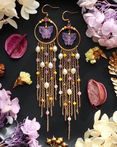 Welcome to visit my Jewelry store:  https://www.etsy.com/shop/Jeansdreamjewelry  Custom order accepted now. Feel free to ask me to see if it is possible. I would love to meet your requirements.  Made to order. Every item will come in a jewelry box for safety during travel and gift giving. These dangle earrings are handmade with all natural high quality and well selected gemstones. They are lightweight and comfortable to wear. All materials used are nickel free, friendly to sensitive skin.  🌷MEASUREMENTS Length: 12.5 cm including ear-wire Width: 2.2 cm 🌷GEMSTONE  🔹Amethyst  🔹Freshwater Pearl 🔹Swarovski Crystal  🌷MATERIALS 🔹14K gold filled  🌷How to take care of my jewelry All handmade jewelry are made with delicate materials that must be handled with care. Please keep your jewelry aw Red Garnet Jewelry, Bead Charms Diy, Garnet Jewelry, Unique Jewelry Designs, Earring Tutorial, Unique Handmade Jewelry, Etsy Earrings Dangle, Dream Jewelry, Lovely Gift