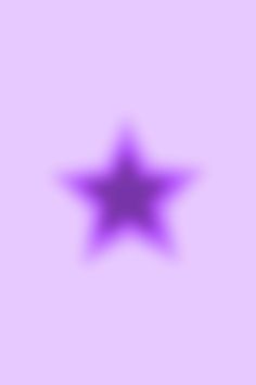 a blurry image of a purple star against a light pink background with the word,