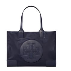 Nothing Says Chic More Than The Tory Burch Ella Mini Tote! - Made Of Durable Nylon With Glossy Coated Handles And Trim. Dual, Rolled Top Carry Handles Made Of Patent Leather. Magnetic Snap Closure. Gusset Snaps Provide Expansion. Stacked Logo. Cotton Canvas Lined Interior Features One Zip And Two Slip Pockets. Measurements: Bottom Width: 13 ½ In Depth: 4 ½ In Height: 9 ½ In Handle Length: 15 In Handle Drop: 6 ½ In Weight: 13 Oz Imported. Tory Burch Ella Tote, Navy Handbag, Ella Tote, Tory Burch Ella, Elegant Style Women, Money Outfit, Tory Burch Tote, Tory Burch Bag Totes, Laptop Bag For Women