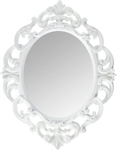 an ornate white mirror hanging on the wall next to a hanger with a hook