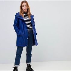 Navy Blue Lined Rain Coat Blue Long Sleeve Rainwear Outerwear, Blue Long Sleeve Outerwear For Rainy Weather, Blue Hooded Spring Raincoat, Blue Hooded Raincoat For Spring, Blue Fall Outerwear For Rainy Weather, Blue Raincoat For Rainy Weather In Spring, Blue Spring Raincoat For Rainy Weather, Asos Petite, Rain Coat