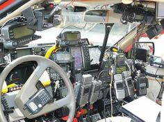 an airplane cockpit with many electronic devices on it