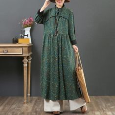 Unique green prints cotton dress Chinese Button cotton robes stand collar DressesCustom make service available! Please feel free to contact us if you want this dress custom made. Materials used: cotton blendedMeasurement:One size fits all for this item. Please make sure your size doesn't exceed this size: XL/US16-18/EUR44 bust 106cm / 41.34"Waist 102cm / 39.78"hem 202cm / 78.78"Shoulder 43cm / 16.77"Armhole 54cm / 21.06"Sleeve length 60cm / 23.4"length 120cm / 46.8"Most of our dresses are made o Retro Floral Dress, Red Green Dress, Chinese Button, Green Prints, Cotton Robes, Stand Collar Dress, Dark Red Dresses, Dress Sleeve Length, Gathered Dress