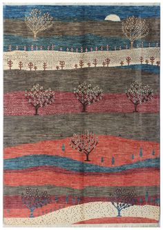 an area rug with trees and hills on it