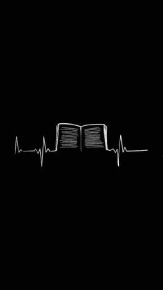 an open book with a heart beat on the cover is shown in black and white