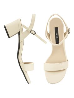 Editor's NotesSPUR's shoes are unique and timeless for everyday wear.- Light-weighted Basic Block Heel Sandal- Eye-catching smooth leather detail- Modern trendy square front toe - Set on a stacked heel for comfortable fit- Feminine and minimal styleMeasurements(in.)- Size: KR 230MM (US 6) ~ KR 255MM (US 8.5)- Heel Height: 2.0in.Composition & Care- Synthetic leather- Avoid direct heat and moisture- Professional cleaning is recommendedDesigner- by SPUR Classic Square Toe Heels For Summer, Classic Summer Heels With Square Toe, Classic Leather Block Heels With Ankle Strap, Classic Sandals With Removable Insole And Square Toe, Classic Heels With Heel Strap In Synthetic Material, Classic Heels With Heel Strap In Synthetic, Classic Block Heels With Heel Strap For Spring, Classic Sandals With Padded Heel And Square Toe, Classic Leather Block Heels With Heel Strap