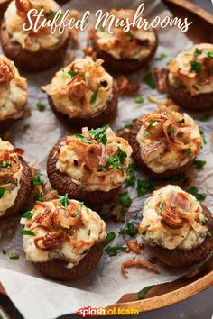 an image of stuffed mushrooms with cheese and parsley on the top for appetizing