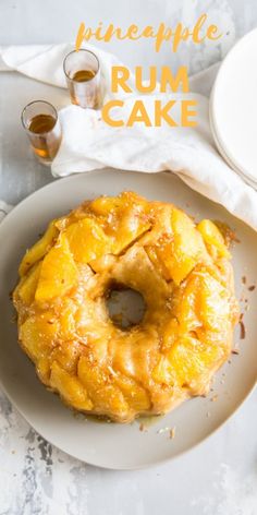 a pineapple rum cake on a white plate