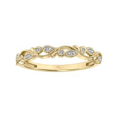 a yellow gold wedding band with diamonds