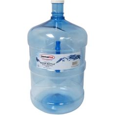 a large blue water bottle sitting on top of a white table