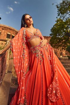 Dolly J | Orange Luckhnavi Lehenga Cape Set | INDIASPOPUP.COM Luckhnavi Lehenga, Kalki Fashion Lehenga, Kamdani Work, Lucknowi Lehenga, Fish Cut Gown, Orange Lehenga, Raw Silk Lehenga, Organza Lehenga, Ghagra Choli