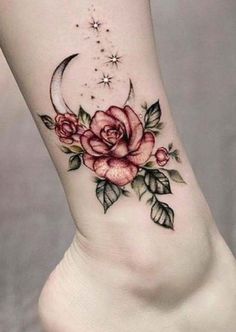 a woman's foot with a rose and crescent tattoo on the left side of her leg