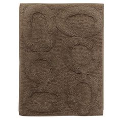 a brown rug with circles on it