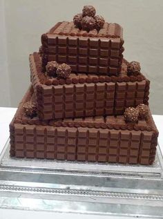 the cake is made out of legos and has chocolate frosting on top with teddy bears