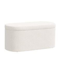 an upholstered white storage box on a white background