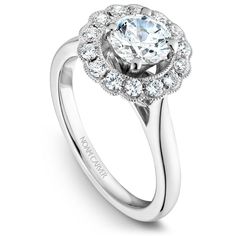 a diamond engagement ring with an oval center surrounded by round diamonds