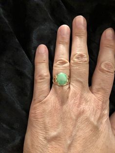 Vintage Solid 14K Yellow Gold Green Jade Heart Design Ring Sz 5 3/4: (In wonderful estate condition) Lovely ring, crafted in solid 14K gold with natural Green Jade and heart shank design, gorgeous! Thank you for your interest and please be sure to see our other listings for more great Jewelry, books and collectables. Want to shop for more items with us here on Etsy? Here is the link: https://www.etsy.com/shop/Shelleyscollectibles?ref=hdr_shop_menu Elegant Green Opal Ring In 14k Gold, Gold Heart Ring With Oval Gemstone, Gold Heart Ring With Gemstone, Heirloom Jade Rings In Yellow Gold, Heirloom Jade Ring In Gold, Elegant Gold Opal Ring For May Birthstone, Heirloom Yellow Gold Jade Rings, Heirloom Gold Jade Ring, Heirloom Jade Rings For Anniversary