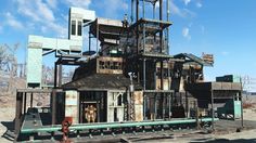 an old building with lots of windows and metal structures on the outside, in front of a blue sky