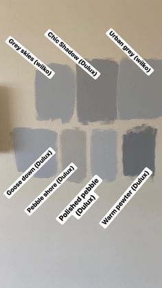 several shades of gray paint on the wall