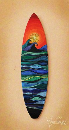 a surfboard is hanging on the wall with an orange sky and sun above it