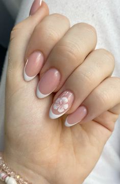 hibiscus flower french tips #nails #frenchnails #summernails Short Oval Nails Flowers, Light Pink French Tips With Flowers, Floral Nails French Tip, Nude Nails Flower Design, French Tip Nails Flower Design, Hibiscus Flower Nail Designs, White Hawaiian Flower Nails, French Tip Acrylic Nails Flower, Simple Nails For Vacation