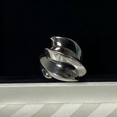 Vintage Mikal Jon Bayanihan Sterling Silver Wave Modernist Ring Brand: Mikal Jon Bayanihan Color: Sterling Silver Size: 7 Approx. 1.5”H From Bottom Of Band To Highest Point Of Wave; 1”W At Top; .25”W Band Weight: 18 Grams Retail: $500 (Sold At Auction) Description: Vintage (80’s) Sterling Silver Wave Modernist Ring, Signed By Designer Mikal Jon. Condition: Vintage; Some Slight Surface Scratches But To Be Expected From A 40yr Old Ring. Has A Dramatic Wave Design, Stunning From Every Angle. See Available Pictures For Detail & Feel Free To Ask Any Questions. Reasonable Offers Will Be Considered Louis Vuitton Gucci Burberry Supreme Chanel Yves Saint Laurent Fendi Dior Hermes Pr Louis Vuitton Gucci, Old Rings, Modernist Ring, Ring Color, Wave Design, Jewelry Vintage, Womens Jewelry Rings, Yves Saint Laurent, Burberry