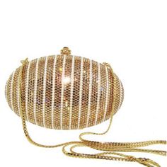 "Heart- stoppingly beautiful design and sparkle! These Evening Formal Oval shaped Purses in gold, gold with pearls and ALL CLEAR will be the talk of town!! Each is handmade. Each takes months to complete, one crystals at a time! Here at Etsy, we offer you the best quality at discounted prices, a fraction of what high priced retailers charge! These are evening bags that are fully covered in genuine, very fine, small sized Swarovski Crystals from Austria! One purse is in all CLEAR CRYSTALS, One is Luxury Gold Bags With Bling, Luxury Gold Bling Bag, Luxury Gold Bag With Bling, Gold Evening Bag With Bling For Events, Elegant Sparkling Crystal Evening Bag, Gold Bags With Rhinestones For Gala, Gold Crystal Embellished Clutch Evening Bag, Gold Bling Clutch Evening Bag, Luxury Gold Clutch For Gala