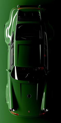 an overhead view of a green sports car with its hood up and tail lights on