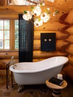 Modern Log Cabin Exterior, Log Bathroom, Rustic Cabin Bathroom, Cozy Mountain Home, Modern Rustic Cabin, Log Cabin Exterior, Slipper Tub, Modern Log Cabin, Cabin Bathroom