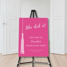 a pink graduation party sign with the words she did it welcome to danielle's graduation party