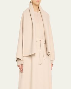 Max Mara "Con Pepaia" top coat    Round neckline; buttonandloop closure    Flared long sleeves    Selftie sash belt    Hem falls below the knee    Relaxed fit     Virgin wool/cashmere    Made in Italy Elegant Beige Outerwear With Self Belt, Elegant Belted Wool Coat With Shawl Collar, Elegant Wool Coat With Shawl Collar And Belt, Elegant Wool Coat With Belt And Shawl Collar, Elegant Cashmere Outerwear For Spring, Chic Wool Coat With Concealed Front Fastening, Elegant Belted Wool Coat For Spring, Elegant Spring Wool Coat With Belt, Elegant Spring Cashmere Wool Coat