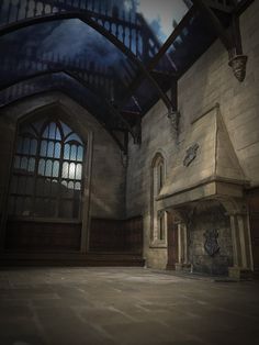 the interior of an old building with stone floors and large arched windows at night time