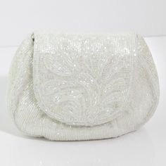 White Embellished Evening Bag, Glamorous White Formal Clutch, Embellished White Clutch Evening Bag, White Clutch Evening Bag For Events, White Embellished Clutch For Events, White Clutch For Evening Events, Glamorous White Clutch With Pearl Handle, Glamorous White Embellished Clutch, White Pouch Clutch For Evening