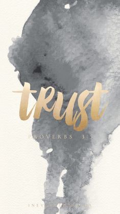 the word trust in gold and black ink on a white background with watercolor stains