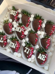 chocolate covered strawberries are arranged in the shape of hearts